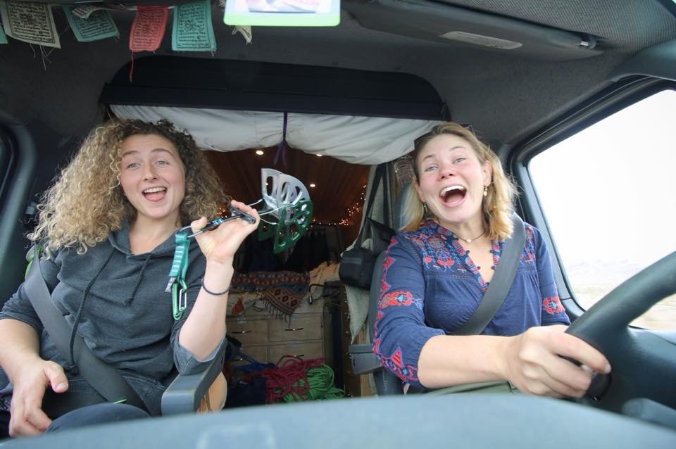 Kaya Lindsay and Kate Sabo on a road trip holding a number 6 camalot 