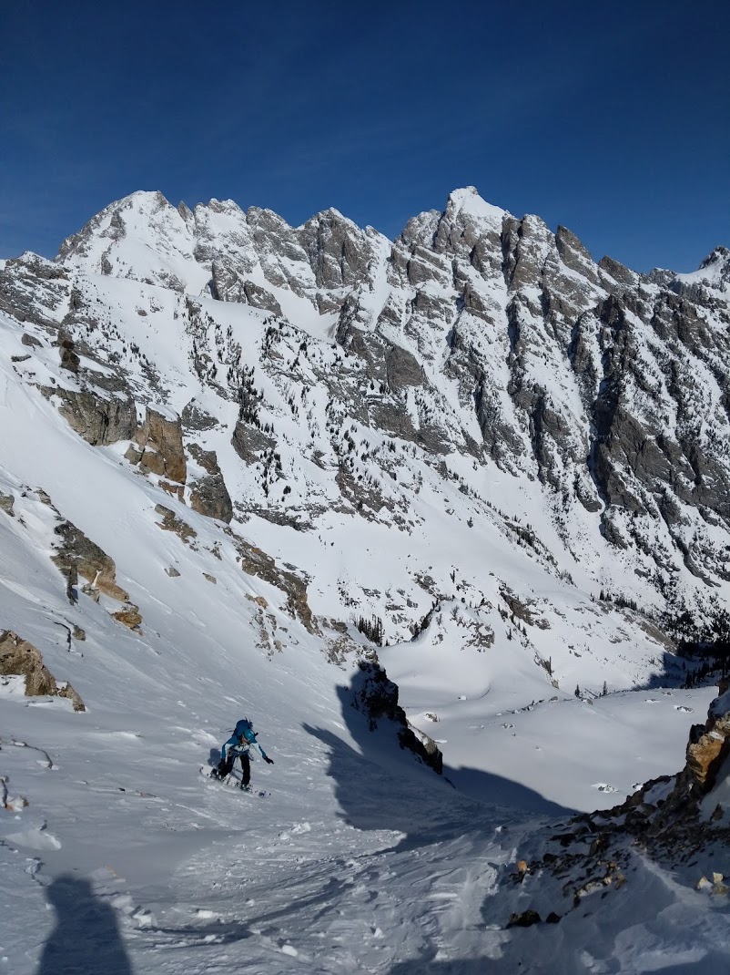 Dani Reyes-Acosta snowboards a couloir on 25 Short in Grand Teton National Park. Photo by Sofia Jaramillo.