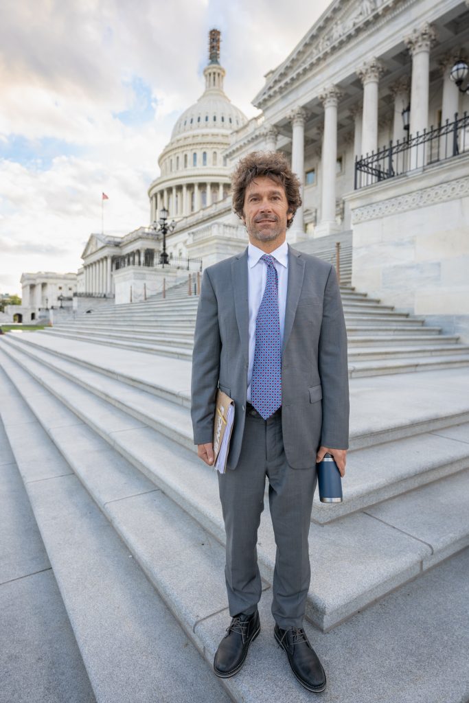 Man standing in front of the White House