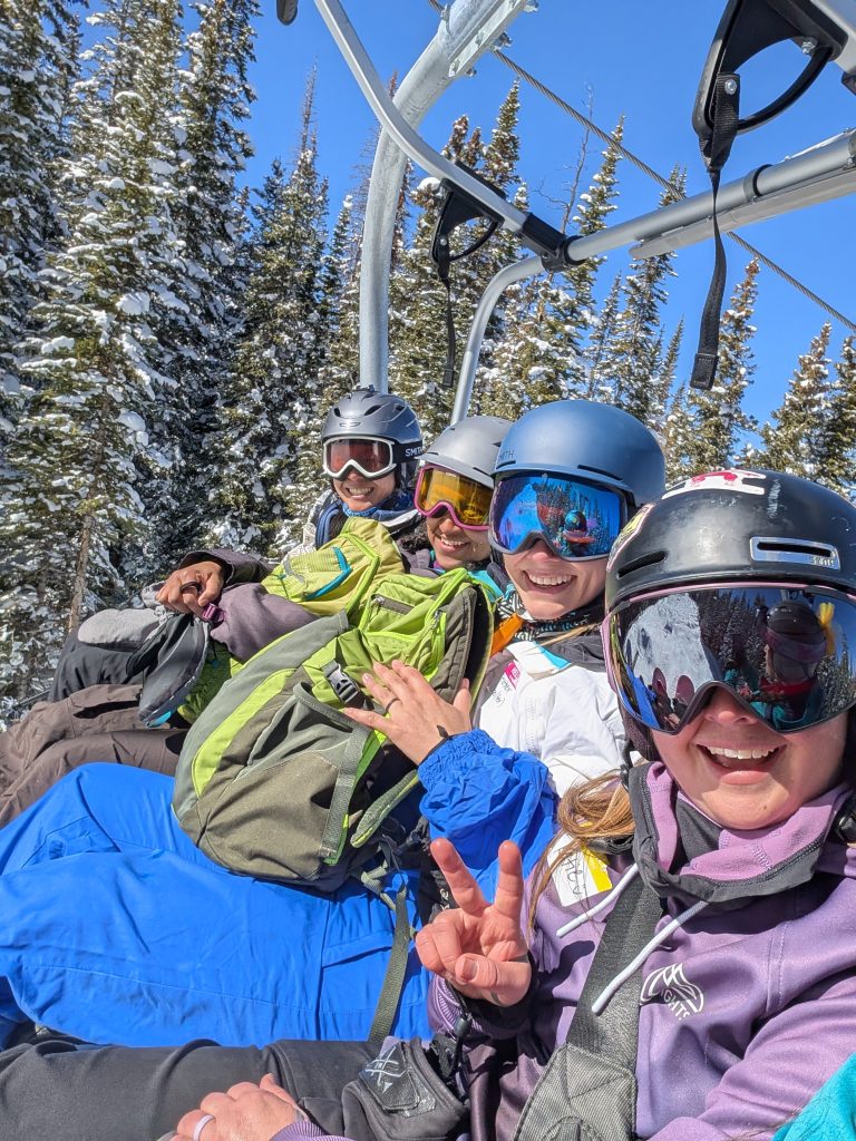 smiling faces on chair lift